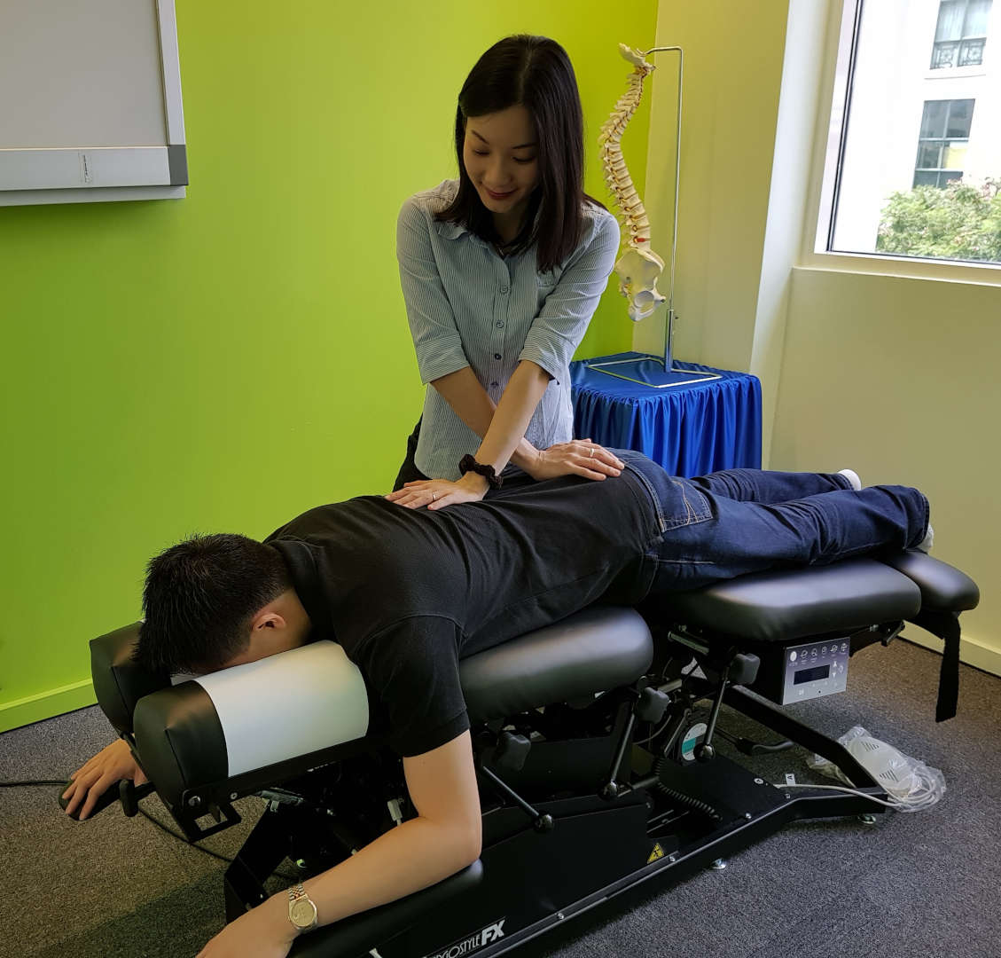 Chiropractic Adjustment - Female Chiropractor Singapore